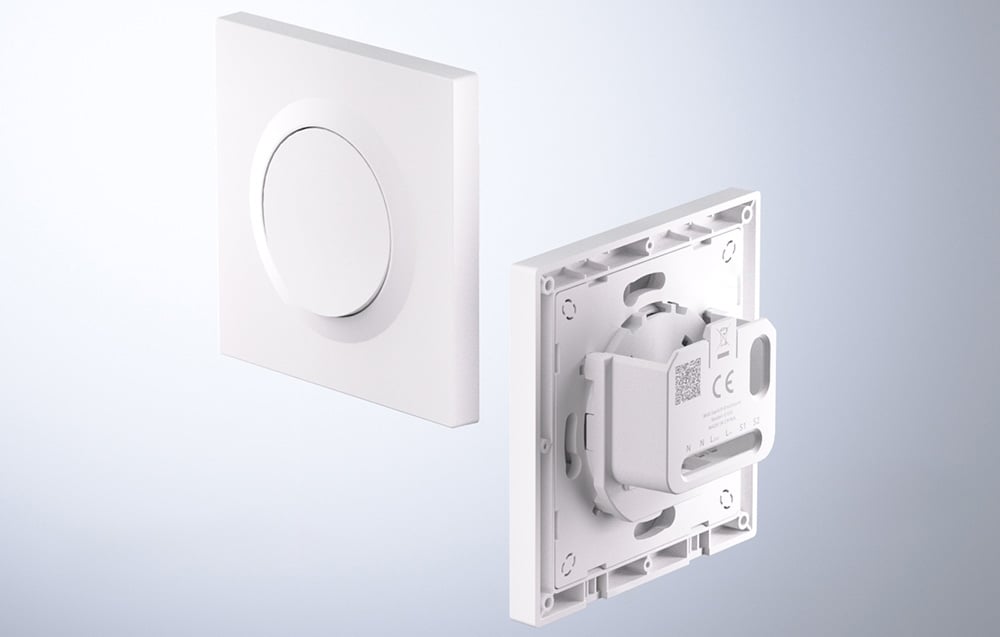 2 white switch housings on a white-gray background.
