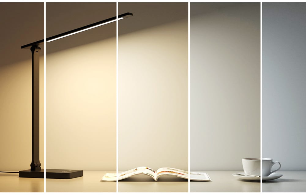 A black lamp on a desk; white vertical lines divide the image into 5 sections showing the device’s different operating modes