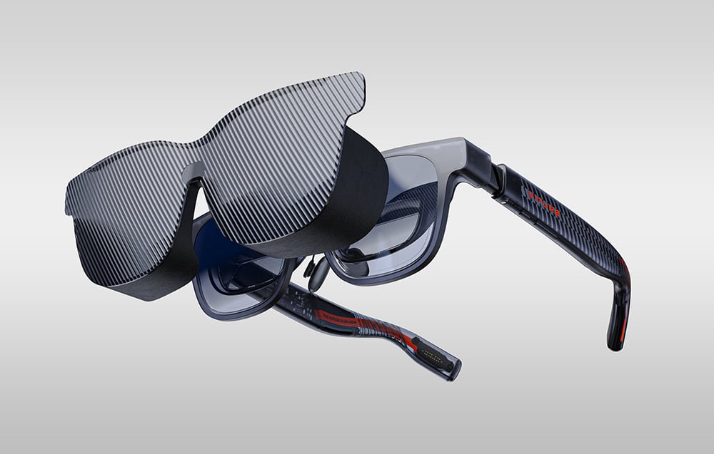 Black Viture glasses with sun visor on a gray background