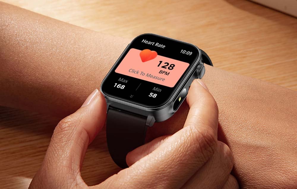 Smartwatch displaying heart rate measurement.