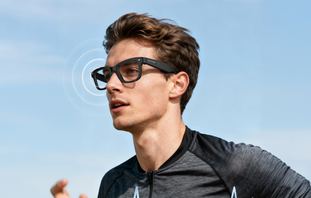 A man running in athletic wear and glasses