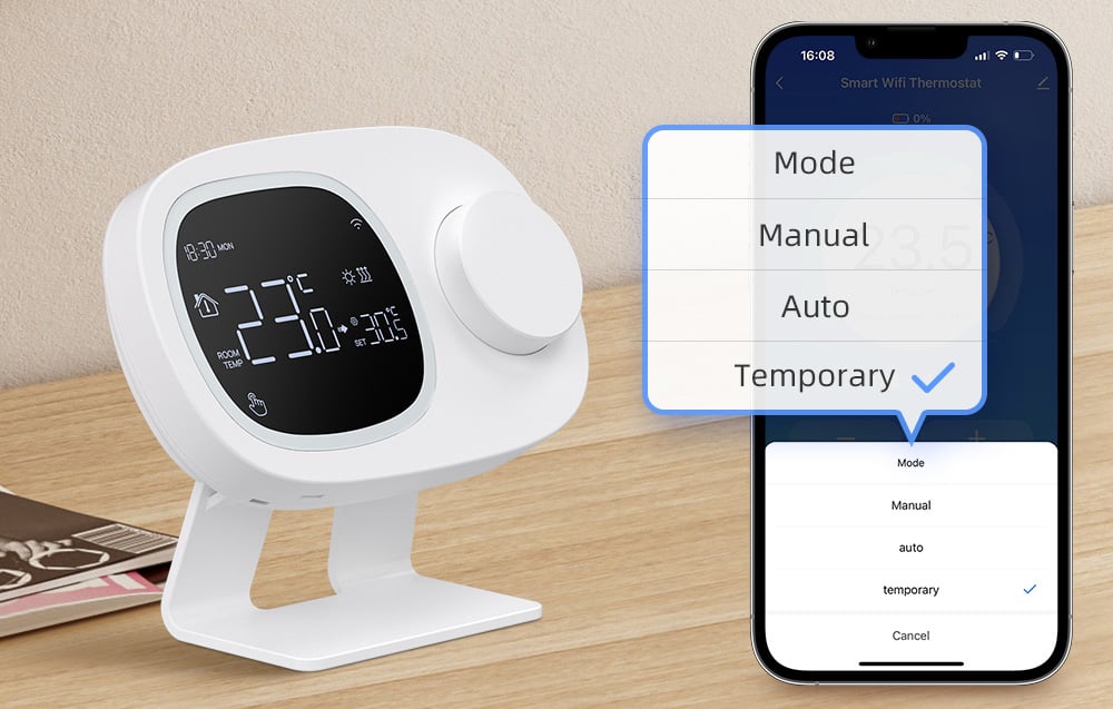 Thermostat with display and smartphone with app enabled on wooden table